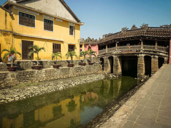 The ancient Japanese Bridge in Hoi An, Vietnam reflecting in the water