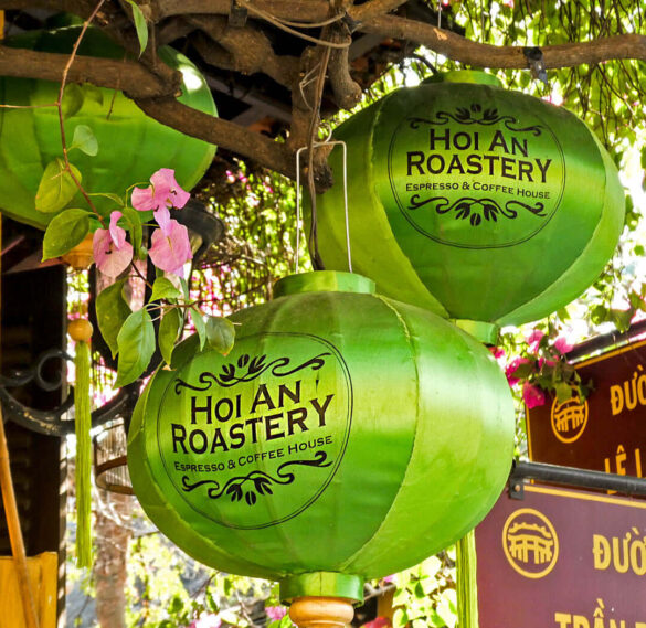 Close-up of green lanterns at Hoi An Roastery Cafe in Vietnam