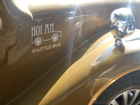 A classic shuttle bus with 'Hoi An' inscription in Vietnam