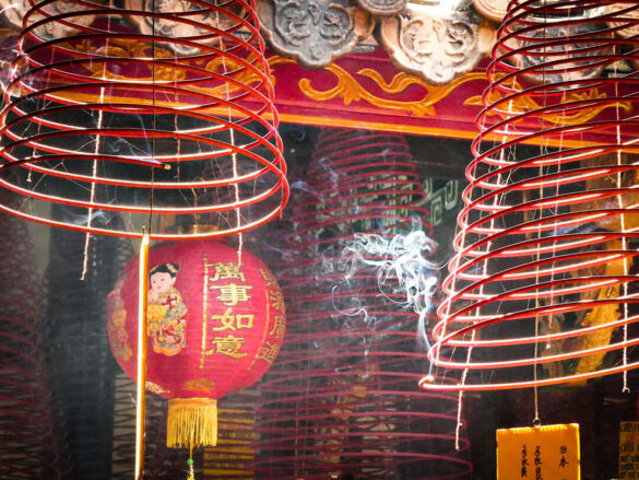 Incense coils burning in a Buddhist Temple in Hanoi, Vietnam