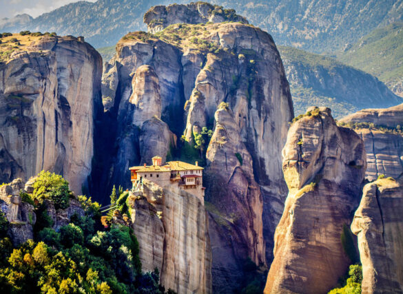 A monastery nestled among towering rock formations at Meteora in Greece